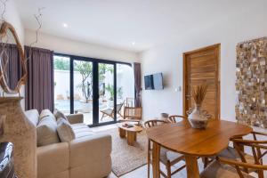 Et opholdsområde på Thomas Beach Residence