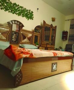 Ένα ή περισσότερα κρεβάτια σε δωμάτιο στο CoupleStays