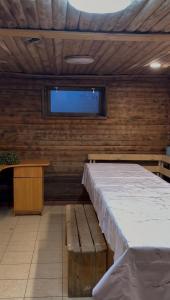 Voodi või voodid majutusasutuse База отдыха с коттеджем toas