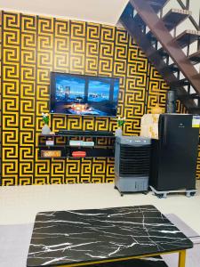 TV a/nebo společenská místnost v ubytování Mizteesaah's Stay