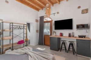 Телевизор и/или развлекательный центр в Arrieta Costa Rural