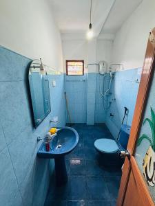 Koupelna v ubytování Nimsara Lodge