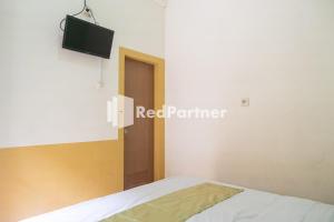 Φωτογραφία από το άλμπουμ του Wisma Handayani Syariah RedPartner near RSUD Wonosari στη Γιογκιακάρτα +22 φωτογραφίες