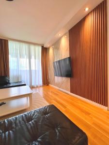 TV a/nebo společenská místnost v ubytování Apartment Hana