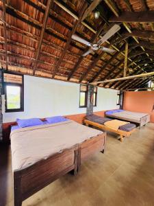 Postel nebo postele na pokoji v ubytování Kottaram Heritage