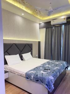 En eller flere senge i et værelse på WanderNest Stay 2