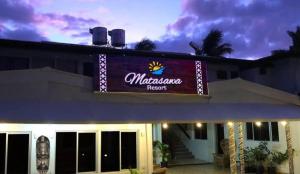 a sign for a malibu resort on top of a building at Matasawa Resort - Wailoaloa, Nadi in Nadi