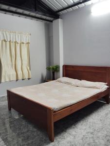 Ένα ή περισσότερα κρεβάτια σε δωμάτιο στο B5 Homestay