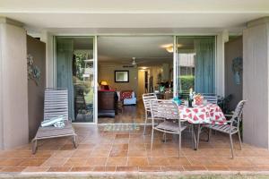 En terrasse eller udendørsområde på Eldorado J111 · EL J111 Garden Studio w AC Pool