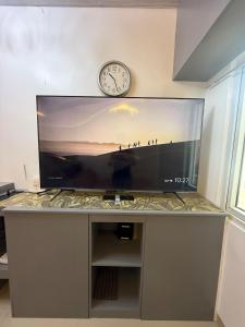 Køkken eller tekøkken på A Cozy Studio at Victoria Sports Tower walking distance to GMA MRT & near SM North EDSA