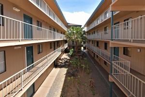 an aerial view of an apartment building with balconies at Pacific Shores B102 · PacSB102 Family Getaway 3BD Across Beach in Kihei