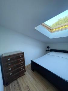 Ένα ή περισσότερα κρεβάτια σε δωμάτιο στο Cozy studio near Lille