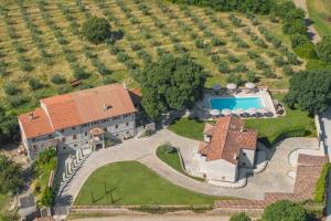 an aerial view of a large estate with a swimming pool at San Tomasini Heritage Hotel in Višnjan