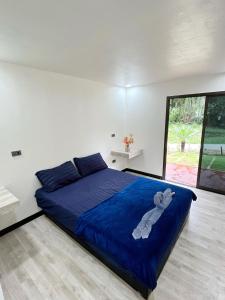 Voodi või voodid majutusasutuse Kohmook Timberland Resort from Seaview toas