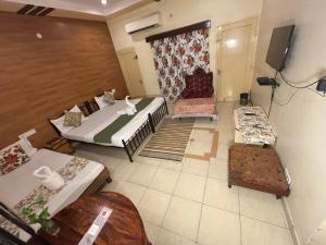 TV a/nebo společenská místnost v ubytování Hotel City Home - A Heritage Hotel