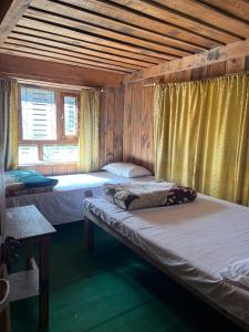 Voodi või voodid majutusasutuse Paldor Peak Guest House toas