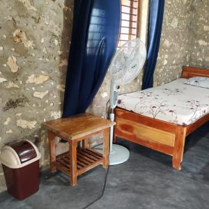 Giường trong phòng chung tại Palmyrah Resort Best Rooms with Sea View +30 ảnh