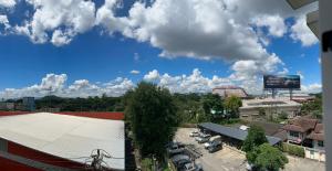 a view of a parking lot in a city at Kalpapruek Grand Park near Central Plaza Pool&Gym in Ban San Ton Ko (1)