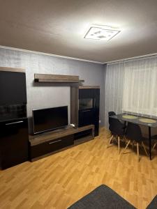 Et tv og/eller underholdning på Guest location by Heralds