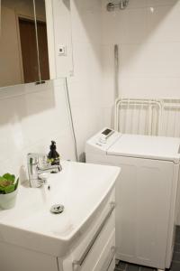 Ένα ή περισσότερα κρεβάτια σε δωμάτιο στο Apartment with great connections +33 φωτογραφίες