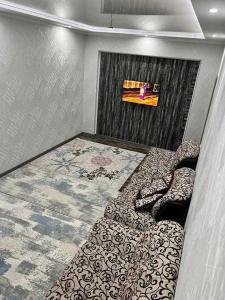 Billede fra billedgalleriet på Апартамент i Tashkent
