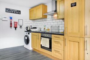 Η κουζίνα ή μικρή κουζίνα στο City Centre Apartment