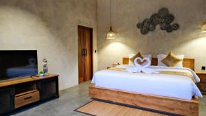 Ένα ή περισσότερα κρεβάτια σε δωμάτιο στο The Tila +43 φωτογραφίες