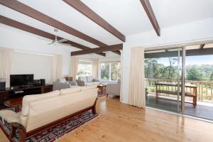 Giường trong phòng chung tại Tee to Sea