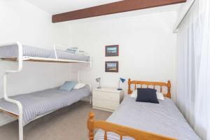 Giường trong phòng chung tại Tee to Sea +12 ảnh