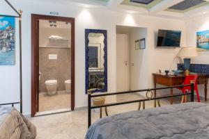 TV a/nebo společenská místnost v ubytování Federico 70 Arabic Style