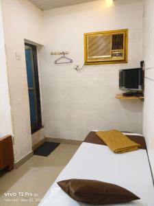 Μια τηλεόραση ή/και κέντρο ψυχαγωγίας στο Hotel Ajanta +7 φωτογραφίες