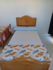 Ένα ή περισσότερα κρεβάτια σε δωμάτιο στο Youth Hostel