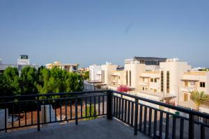 a balcony with a view of some buildings at The Villa Haramous in Djibouti