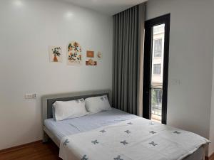 Postel nebo postele na pokoji v ubytování Tấm homestay