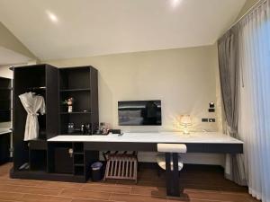 Η κουζίνα ή μικρή κουζίνα στο Sangtawan Resort +13 φωτογραφίες