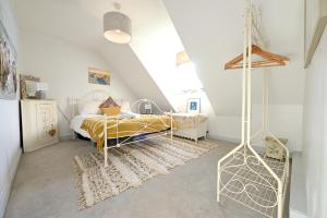 Voodi või voodid majutusasutuse Beautiful Thatched Cottage Windsor Ascot Bracknell toas