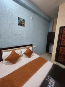 Postel nebo postele na pokoji v ubytování SRT Homes