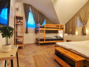 Postel nebo postele na pokoji v ubytování Artizan Chalet