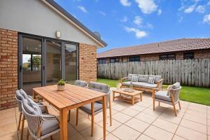 En terrasse eller udendørsområde på East Luxury house