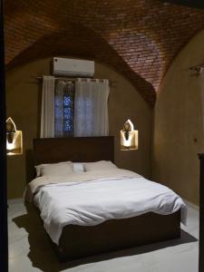 Ένα ή περισσότερα κρεβάτια σε δωμάτιο στο Lovely Private Villa