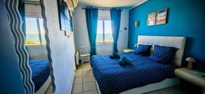 Postel nebo postele na pokoji v ubytování TI PAMS Vue MER Parking gratuit du 1 juin au 30 Septembre