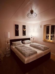 Ένα ή περισσότερα κρεβάτια σε δωμάτιο στο VagabundNEST Altstadt Freinsheim