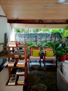 Posezení v ubytování Tripo Dhiffushi Villa + 10 fotografií