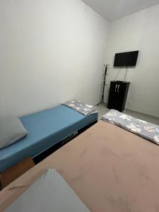 Postel nebo postele na pokoji v ubytování Pousada Mirante da Serra CMD