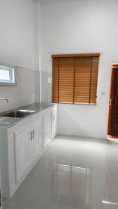 Köök või kööginurk majutusasutuses mini chat stay มินิ แชท สเตย์