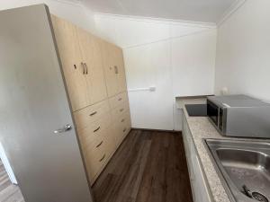 Una cocina o cocineta en U4A ensuite room