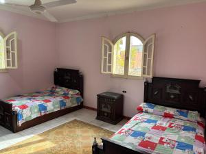 Ένα ή περισσότερα κρεβάτια σε δωμάτιο στο Apartment in a village