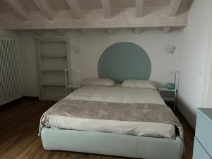 Postel nebo postele na pokoji v ubytování Agriturismo Maso San Valentino