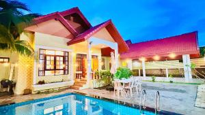 Πισίνα στο ή κοντά στο 海边独栋五卧花园泳池别墅 +9 φωτογραφίες