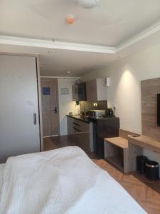 Η κουζίνα ή μικρή κουζίνα στο Studio apartment in Suntwilight near to expomart